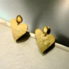 Golden-Love-Earrings-in-heart-shape-crafted-in-18k-gold-plated-brass-with-a-delicate-hammered-finish