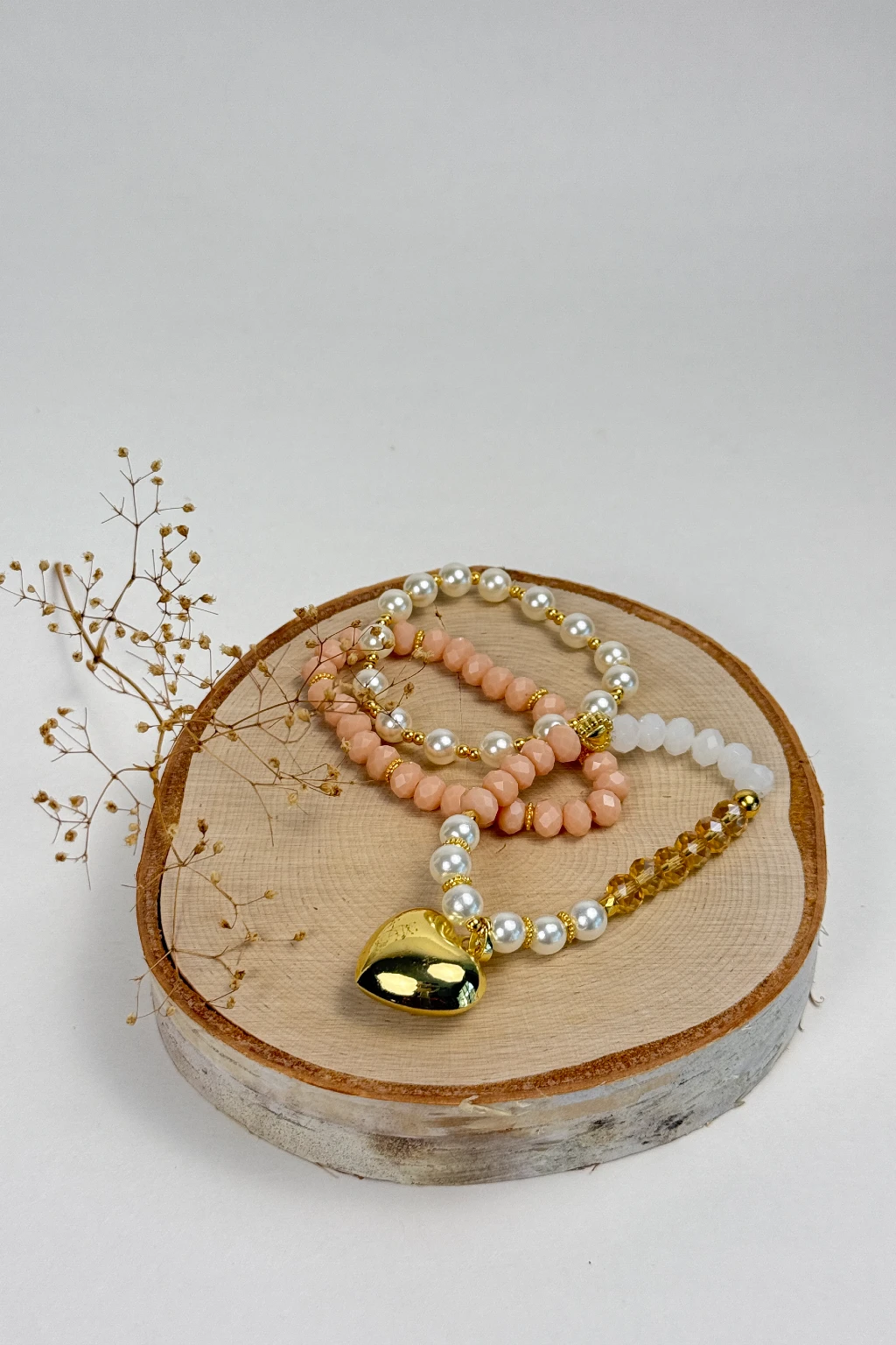Honey-Heart-elastic-bracelet-crafted-with-pearls-and-natural-stones-accompanied-by-18k-gold-plated-bronze-details