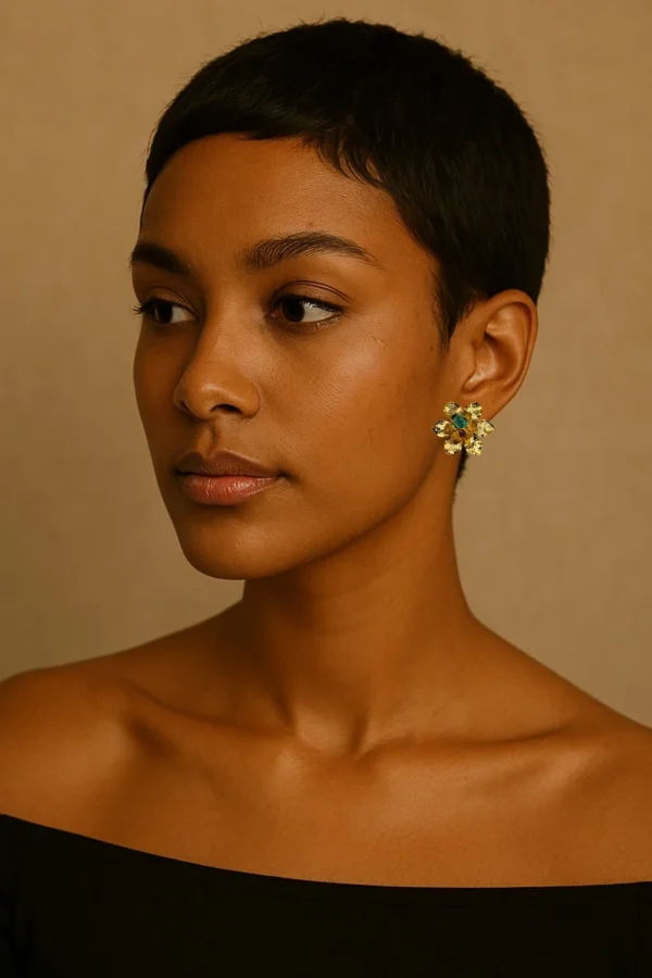 Natural-Essence-earrings-crafted-in-18k-gold-plated-bronze-with-a-young-emerald-at-the-center