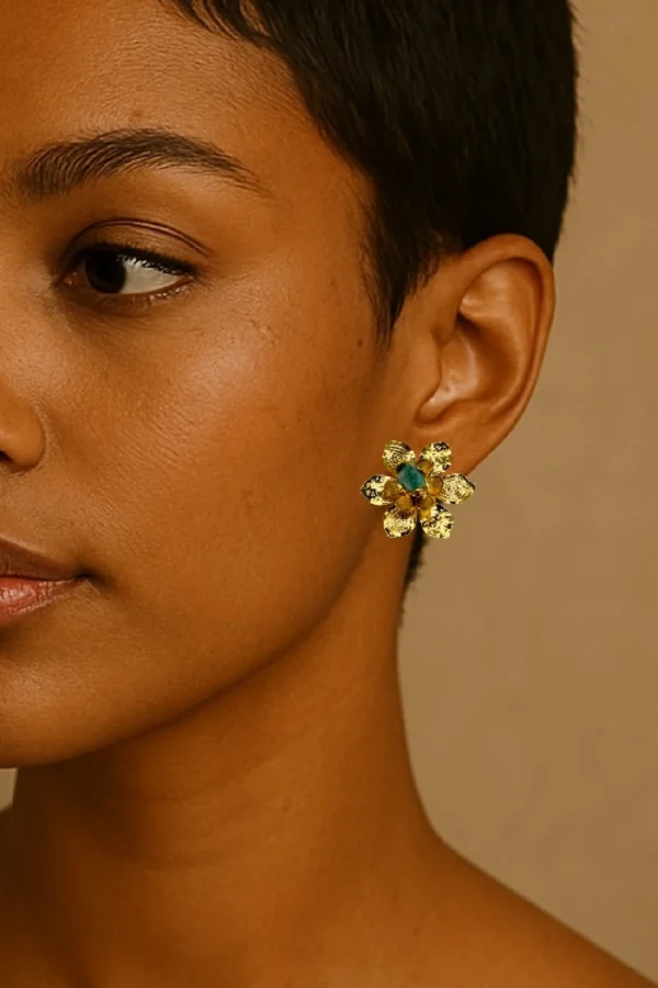 Natural-Essence-earrings-crafted-in-18k-gold-plated-bronze-with-a-young-emerald-at-the-center