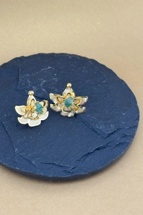 Sacred-Lotus-earrings-crafted-in-18k-gold-plated-bronze-with-a-young-emerald-in-the-center