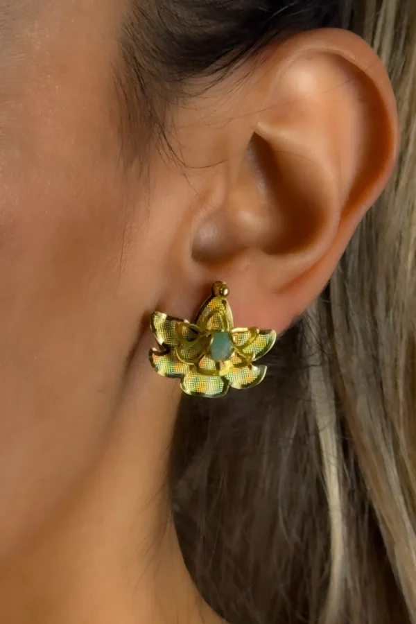 Sacred-Lotus-earrings-crafted-in-18k-gold-plated-bronze-with-a-young-emerald-in-the-center