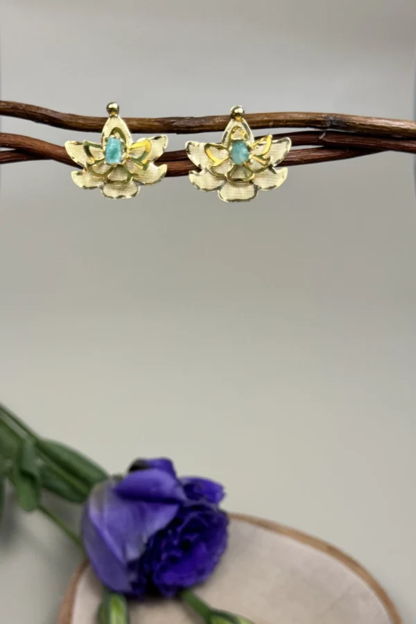 Sacred-Lotus-earrings-crafted-in-18k-gold-plated-bronze-with-a-young-emerald-in-the-center